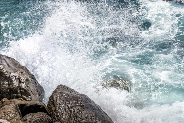 Photo of the Week by Bob Crum. Getting wet to get the shot. Crashing wave... south of Magu Rock Photo data: ISO 640, 70mm, f/11 at 1/1600 sec. 