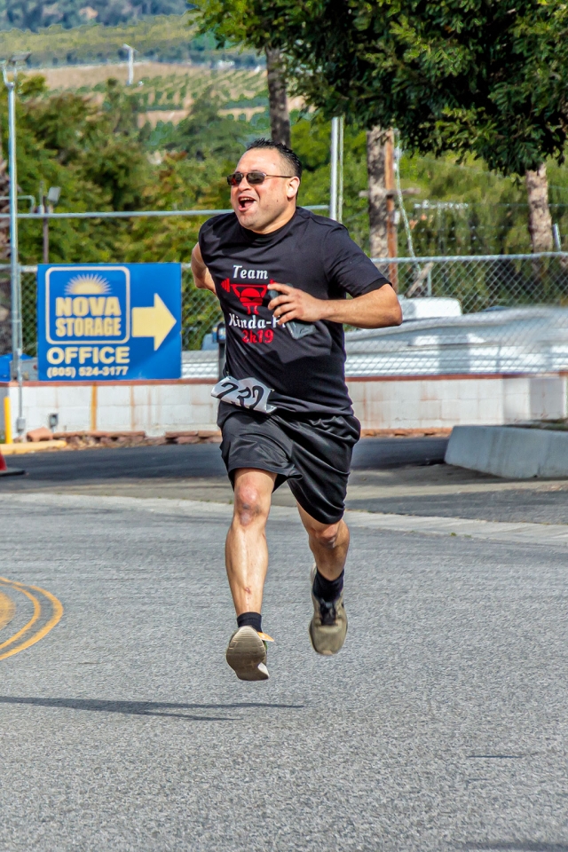 Photo of the Week: "Capturing both feet of the runner in the air a matter of timing. No do-overs for such photos: by Bob Crum. Photo data: Canon 7DMKII camera, manual mode, Tamron 16-300mm lens @151mm. Exposure; ISO 200, aperture f/11, 1/250th of a second shutter speed.