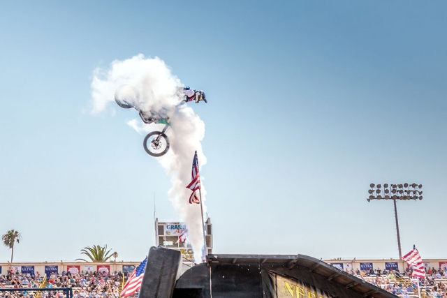 Photo of the Week "Luke Dolin, Flying Cowboyz FMX rider performing at the Fair rodeo" by Bob Crum. Photo data: Canon 7DII camera in manual mode, burst setting, Tamron 18-400mm lens at 23mm, aperture f/10, shutter speed 1/320 second.