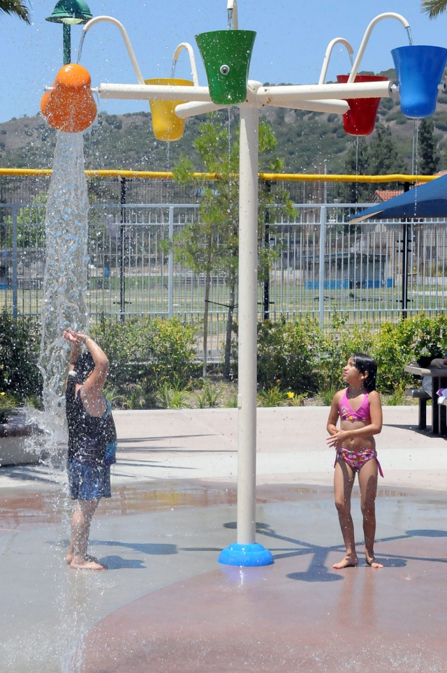 There’s nothing like a bucket of cold water on a hot summer day. The pool is open and ready for business.