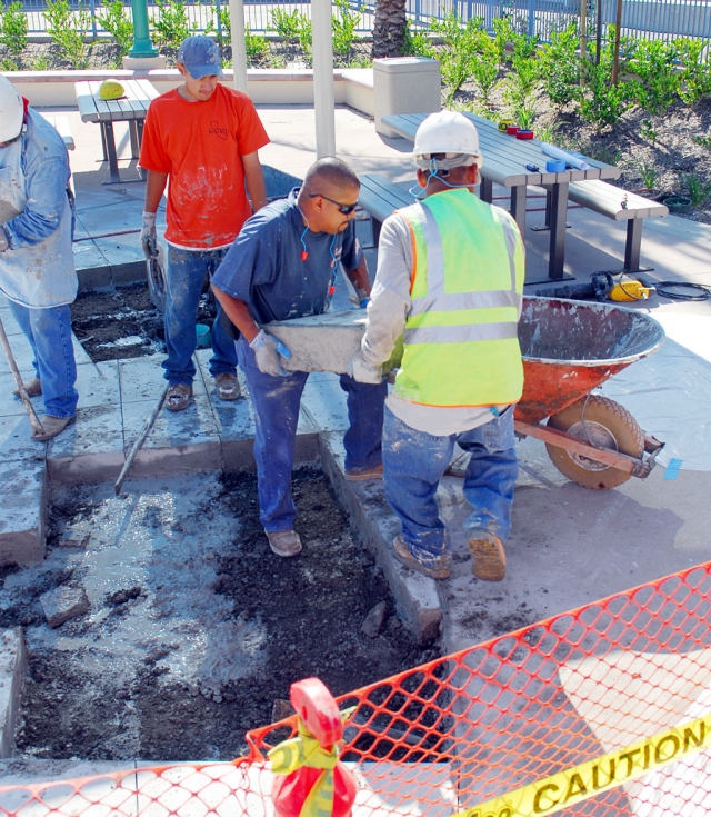 The play area must filter its water like a swimming pool and drains are needed around the area to keep deck water from flowing into the play area. Deck water is considered to possibly contain contaminants. The rest of the pool is open for business.