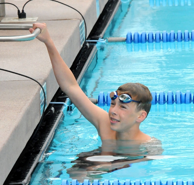 Nick Johnson, 15, gets ready for the swimming event.