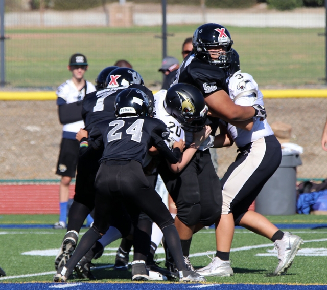 Below are the Fillmore Raiders game results for Saturday, September 22nd: Raiders Mighty Mites Black (home game) vs. Valley Thunder 20-0, (Raiders). Raiders Mighty Mites Silver had a Bye week. Raiders Bantams (home game) vs. Saugus 22-0, Saugus. Raiders Sophomores (home game) vs. Simi Valley Bulldogs no score reported. Raiders Juniors (home game) vs. Mid-Valley 35-0, Raiders. Raiders Seniors (home game) vs. Camarillo 38-20, Raiders. This week’s games will be September 29th: Raiders Might Mites Black vs. San Fernando Rush 8am at Cleveland High School. Raiders Mighty Mites Silver vs. Santa Barbara 8am at Rio Mesa High School. Raiders Bantams vs. Santa Barbara 10am at Fillmore High School. Raiders Sophomores vs. Carpinteria 8am at Carpinteria High School. Raiders Juniors have a bye week. Raiders Seniors have a bye week. All Fillmore Raiders Youth Football & Cheer Photos by Crystal Gurrola.