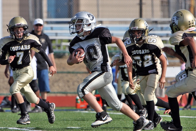 #20 Anthony Morales takes it up the middle for a long TD run the only TD of the game.