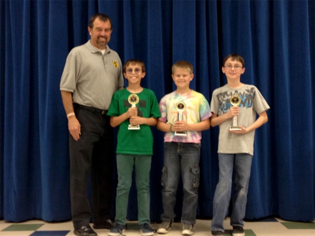 Mountain Vista held its 2nd Trimester Awards Program on Monday, March 17th.  Students in each class were recognized by their teachers for outstanding academic achievement, outstanding citizenship, perfect attendance with no tardies and for being the outstanding reader of the class.  The three top readers of the entire school were recognized by  Principal Wilber for reading over one million words.  Fifth grader Ethan Gray was honored for being the top reader in the school having read 1,583,416 words,  George Mooradian was honored for reading 1,099,642 words and Nicolas Boon was honored for 1,067,884 words.  The boys are also receiving a $20.00 gift certificate to purchase their own books. Mr. Wilber would like to thank Ray Tafoya from Gold Coast Embroidery for donating the trophies for the top readers.