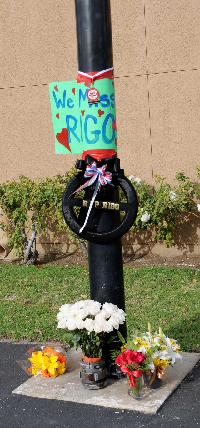 We miss you Rigo. All over Fillmore, flags fly at half mast in honor of Fillmore Fire Chief Rigo Landeros. This one is in front of the Fire Department. A memorial has been created at the base of the flagpole. A sign reading ‘We Miss You Rigo’ and flowers express a very small part of what the community as a whole is feeling at the loss of this wonderful man. He served the community tirelessly and was a friend to everyone he met.
