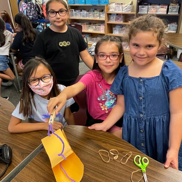 Above and below are Rio Vista students in Mrs. Moise’s third grade class using their engineering skills to create bridges after learning how the Golden Gate Bridge was built. Photos courtesy Rio Vista Blog.