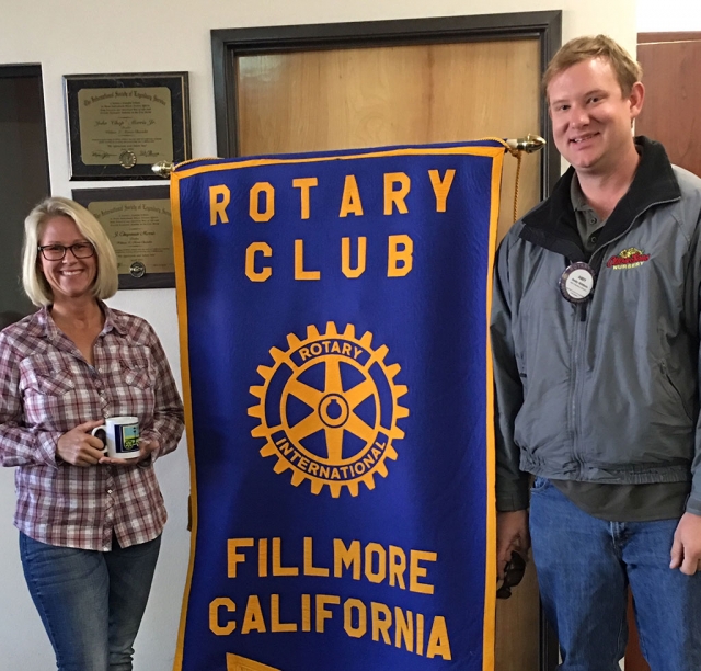 Fillmore Rotary Club Recognizes Lisa Stevens. Fillmore Rotary Club received a visit from Lisa Stevens who owns a non-profit corporation that trains dogs to sniff drugs, black powder and weapons at schools. She informed the Club that since she is non-profit she is able to aide schools who can’t usually afford this type of service such as Fillmore High. Not only does she train dogs, but she trains retired Veterans and Police Officers who are the handlers as well. Pictured is President Andy Klittich presenting Stevens with a Rotary mug.