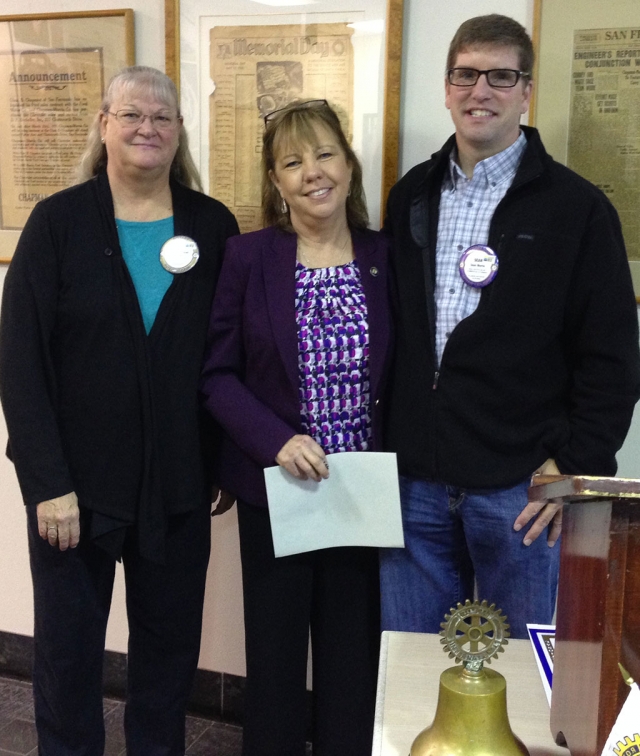 Sponsor, Cindy Blatt, new Rotary member, Carrie Broggie and Rotary President Sean Morris. 