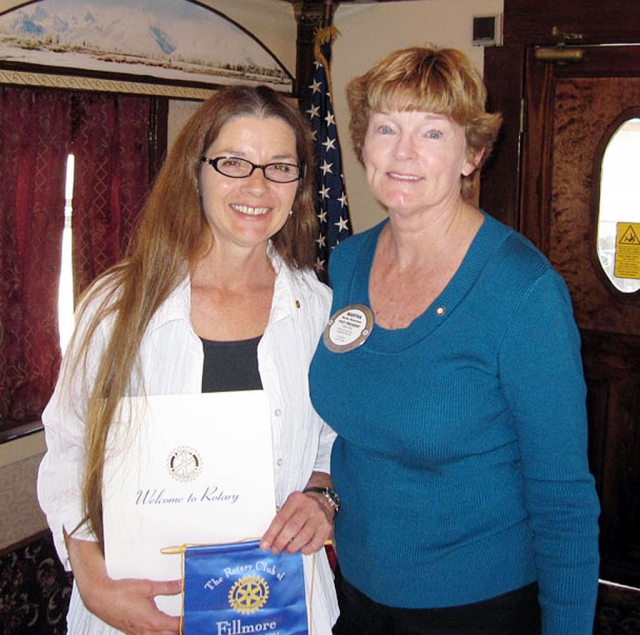 Pictured (l-r) Julie Latshaw, from Fillmore & Western Railway, was inducted into membership in the Noontime Rotary by Martha Richardson.