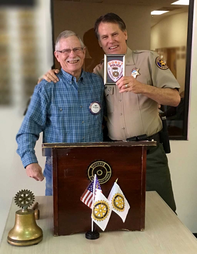 Rotarian Bob Hammond presented Tim Hagel with a “Donut Police Patch,” he found during his travels. Tim presented a program, to Rotary, on Safe Passage. This is a program designed by Law Enforcement to lead children toward a successful education and activities instead of potential gang affiliations.
Submitted By Martha Richardson