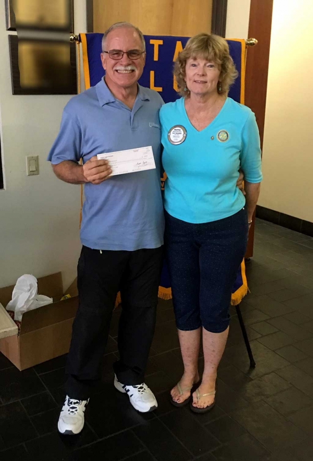 Rod Thompson of Life Water accepted a donation from Martha Richardson. Life Water is an International group that builds water wells in needy countries, teaches the people how to maintain the wells, sanitation, and how to have a healthy life.