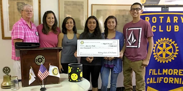 Cindy Blatt Rotarian, introduced Kim Tafoya, coach and new AD at Fillmore High School who gave the program. With her are the FHS X-Country captains President Lauren Magdaleno, Vice President Jackie Chavez, Treasurer Carissa and Secretary Michael Sanchez.