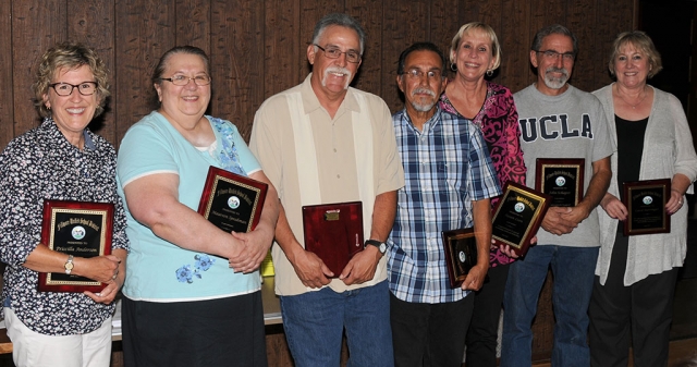 Pricilla Anderson, John Schaper, Maureen Speakman, Tim Golson, Tony Vega, Susan Leon and Carol Barringer. Not pictured are Wayne Bauer, Ellen Dewey, Patsy Torres and Joanna Michel.