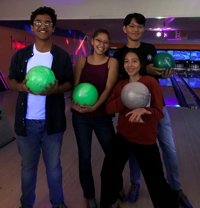 This year's foreign exchange students are (l-r) Mujtaba “Tabs”, Tori Gonzales (host sister), Napason “Benz”, and Munkh, having some fun at a bowling alley together.