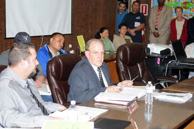 Mr. Davis addresses the concerned parents about F.M.S. repairs at Tuesday night’s School Board meeting