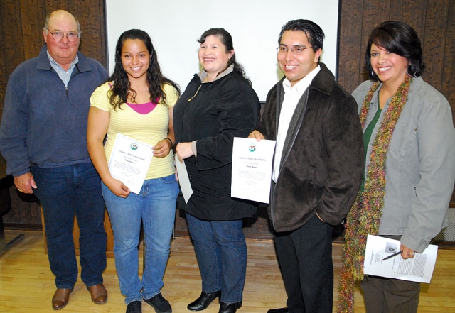 Pictured (l-r) School board member David Dollar, Mayra Regalado Migrant Student of the Year, Laura Quintana Migrant Parent of the Year, and Homero Magana Migrant Alumnus of the Year.
