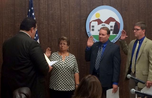 Fillmore Unified School District Superintendent Dr. Adrian Palazuelos lead the swearing in of returning Board Member Lucy Rangel, and new Members Scott Beylek and Sean Morris at Tuesday night’s meeting. Photo courtesy Todd Schieferle.