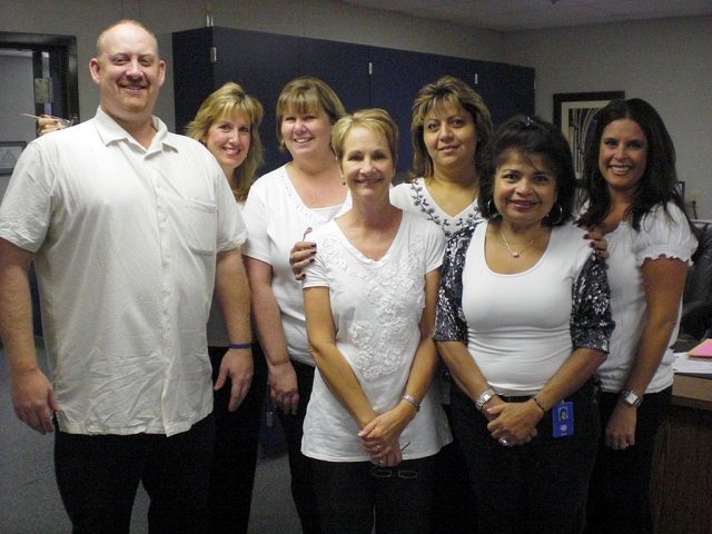 Fillmore Middle School office staff - John Schweller, Ronda Reyes-Deutsch, Mary Ecklund, Luanne Brock, Lupe Reyes, Patty Hurtado and Dena Wyand. Photo by Scott Carroll.