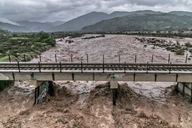 Photo of the Week by Bob Crum. Sespe Creek, mighty and muddy. Photo data: 16mm (16-300mm lens), 1/125 sec, aperture f/11, ISO 10,000. Location: Old Telegraph Road bridge looking north. Email comments, suggestions or questions to: bob@fillmoregazette.com