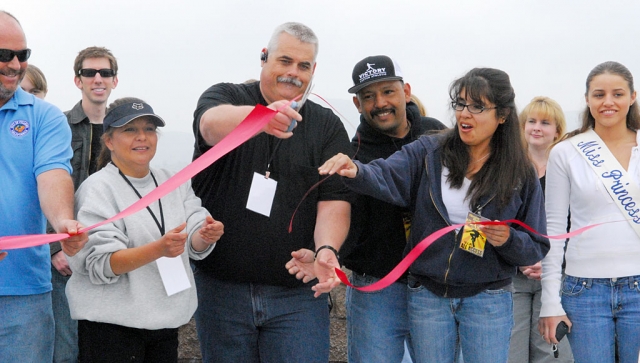 Pictured above are City Attorney Ted Schneider, Councilmembers Laurie Hernandez and Steve Conaway, David Lugo, former councilmember Cecilia Cuevas, and Jayme Harter, Miss Fillmore Princess. Skate Park Opening Facts:
Special Appearances / Pro Skaters / Skater Personalities include: Tony Alva, Jeff Tatum, Per Welinder, Michael
Early, Brad Edwards, Greg Fountain, Matt Bloise, Steve Badilla, Tony Alva was the first World Stake Board Champion in 1977. He is one of the most influential skate boarders of all time. He held the world record for jumping barrels according to Guinness Book of World Records. He was the first skateboarder to start his own company and brand his name. Tony continues to skate to this day and can skate with the best of the best. He is a friend of Fillmore and has skated the Fillmore park on several occasions. Jeff Tatum designed the Fillmore Skate Park. Jeff was one of the Down South boys who called San Diego home. He has an underground reputation. Jeff is a talented skate board artist. His designs can be seen on Pool King boards and some will be designing boards for Tony Alva. Per Welinder is a prior Free Style skate board champion from skating early days. He has been featured in numerous skate videos and was the stuntman for “Back to the Future” skating scenes. He formed Birdhouse Project with his partner Tony Hawk. Brad Edwards skates for Gravity Skate Boards. He is the worlds premiere longboard pool rider at this time. He skates for fun and infectious with his attitude and ability to inspire others. Greg Fountain skates for Pool King Skate Boards and has been featured in magazines and countless websites. Park Designed by: Jeff “the original longboarder” Tatum. Brought to life by: Scott Rice at Community Works Design Park Built by: California Skate Park Park size: Approximately 22,000 sq/ft. It took approximately 13 months from the redesign to the soft opening of the park. El Pescador fed the VIPs. Thanks to Rigo Landeros for his contribution and support.