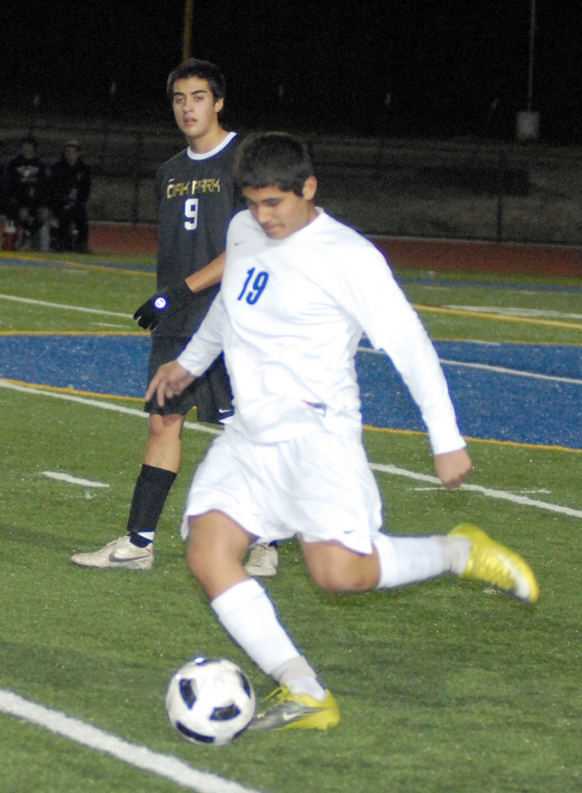 Robert Vasquez #19 gets a free kick. According to Coach Lomeli, Oscar Alferez and Ruben Camarena played well.