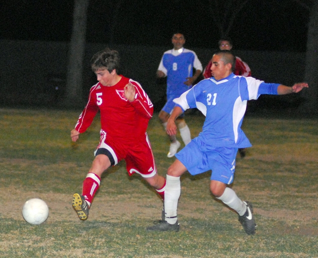 Angel Valenzuela #21 tries to steal the ball away from Bishop Diego’s player. Fillmore beat Bishop Diego 5-0. Goal’s were scored by Marquis Garibay 2, Ernesto Ballesteros 1, Jordan Jasso 1, Braulio Martinez 1 and 1 assist, Tim Avila also had an assist.