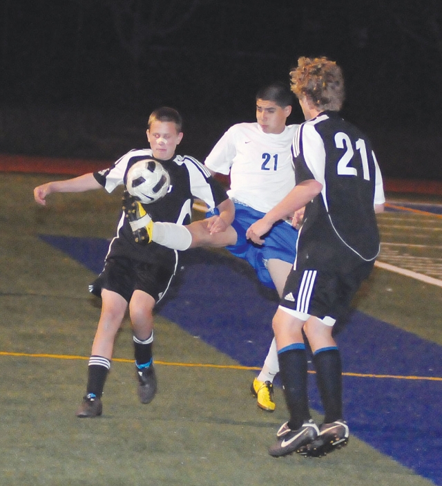 Emmanuel Magana #21 kicks the ball to keep away from Malibu. Jose Mariscal scored 2 goals and Christian Magana scored the game winning goal.