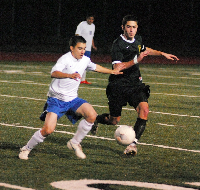 Gerardo Calderon controls the ball and keeps it from Oak Park.