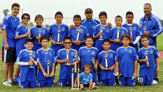 Top row: Coach Javier (Bofo) Candelario, Jesus (Big JJ) Hinojosa, Michael (Mickie) Garcia, Enrique Gutierrez, Jose Valdez, Coach Ignacio Calderon, Saul (Ochoa) Santarosa, Ivan Zepeda, Luis Posada, Coach Octavio Hernandez. Bottom row: Christian Rosales, Edgar Rea, Cristian (Kiki) Hernandez, Cristian (Cris) Candelario, Joel (Chavalala) Garza, Julian (Ju) Calderon, Alejandro (Alex) Rodriguez, and water girl Isabella (Bella) Calderon. Not pictured: Jaime (Little JJ) Gonzalez, Team Mom Alyssa Calderon and Team Mom Libby Candelario.