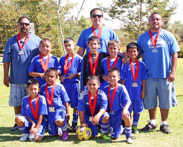 Front row (l-r) Adrian Martinez, Javier Mendez, Damian Magana, Anthony Magana. Second row Jesus Calderon, Sergio Becerra, Damon Villa, Odin Rosten and Mike Garibay. Coaches Damian Magana, Frank Garibay and Omero Martinez.