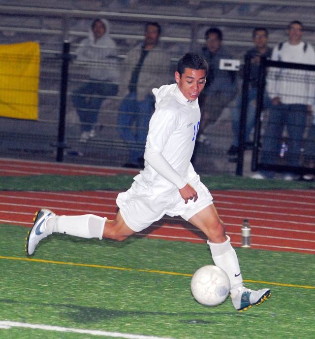 Braulio Martinez above, takes the ball down the field last Monday. Martinez scored one of the 2 goals.