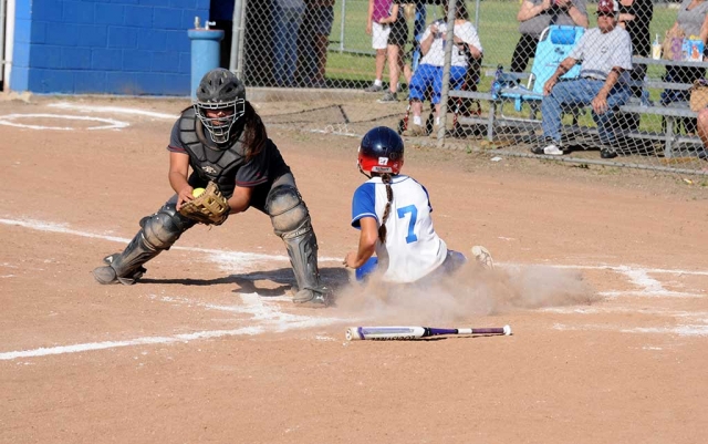 (above) Flashes varsity player sliding in safe at home plate to score for Fillmore. The Fillmore Lady Flashes J.V. and Varsity took on Santa Paula last Thursday. After a hard battle for both J.V. and Varsity, Fillmore lost to Santa Paula. Final Scores: J.V. 5-6, Varsity 4-5.