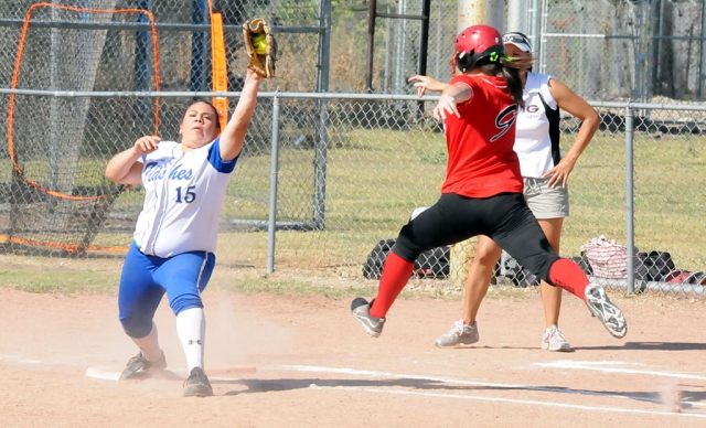 (above) Maritza Meza #15 stretches for the ball to get the runner out at first base. The 2011 Softball season for the FHS Lady Flashes will be coming to an end next week.  The Lady Flashes Varsity team played against Grace Brethren on Tuesday, May 3rd winning 5 – 0.  Karinna Carrillo was the top hitter for the Flashes going 3 for 3.  Jaynessa Lopez went 3 for 2 with a double and a single while Olivia Alcozar went 2 for 3 with singles to help the Lady Flashes.  Amber Magana was on the mound for the Flashes pitching a great game.  The last home game will be on Thursday, May 5th.  Starting at 3:15 pm 5 seniors will be recognized prior to the start of the game against Oaks Christian.  The 5 seniors are Heidi Hinklin, Lilah Duran, Samantha Wokal, Maritza Meza and Olivia Alcozar.  Other team members are Chellie Arreguin, Jaynessa Lopez, Candace Stines, Amber Magana, Kennedy Smith and Karina Carrillo. Overall the Lady Flashes have had a successful season with a record of 16 -5 overall, 5-4 in League.  Next week they will play on Monday at Nordhoff High School, and Tuesday against St. Bonaventure at Camino Real Park.