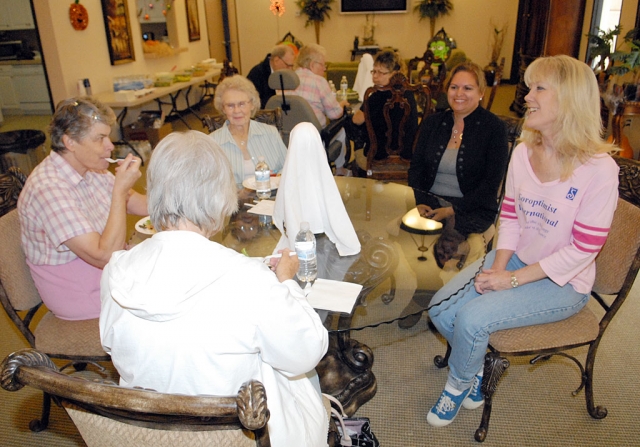 On Friday October 22, Soroptimist International of Fillmore hosted a “Parade of Salads” for all of the residents of Parkview Court Apartments. Above Jane David a Soroprimist member enjoys a conversation with some of the residents.