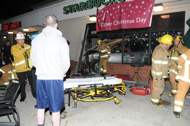 Michael Cederland observes where his car crashed into Starbucks, killing Sergio Mendez, 30.