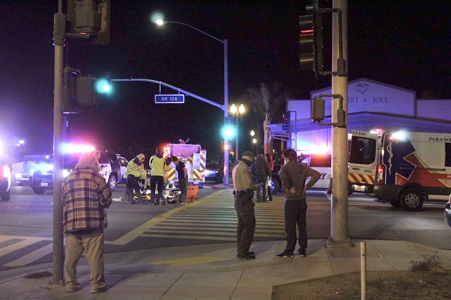 On Tuesday, February 2nd at 8:14 pm Fillmore Police, Fillmore Fire Engine 91 and AMR responded to a traffic collision involving a pedestrian. The accident occurred in the intersection of Ventura St. (Hwy 126) and Central Avenue. The pedestrian was transported to a local hospital, injuries unknown. The cause of the accident is under investigation. Photo courtesy Angel Esquivel - AE News.