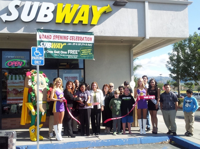 Fillmore Subway held a ribbon cutting ceremony Saturday, hosted by the Fillmore Chamber of Commerce. Cutting the ribbon is new owner Paully Thiara. Balloons, treats and coupons were given to the crowd along with prizes. A big treat for the event were the two Lakers girls who signed autographs and posed for photos.