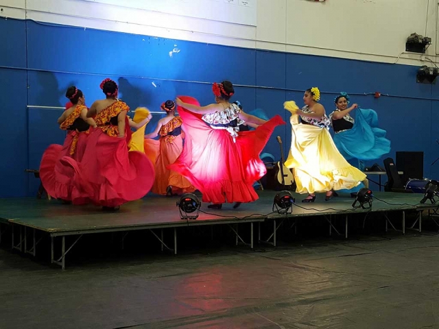 The FHS Talent Show was held on Friday, April 28th to a packed house. The dance acts were very diverse and equally marvelous. They ranged from Ballet Folklorico (above) to K Pop to Latin back up dancers, singing, magic, drama and literary readings. Ms. Benavidez sang Gloria Estefan’s Mi Tierra, with girls from Ballet Folklorico performing as back up dancers. Contemporary songs where sung but also surprisingly songs for the older set were performed. Frank Sinatra’s New New, York New York and Elvis’ Can’t Help Falling in Love. Also a wonderful song from A Chorus Line was performed. The musical acts were very good and bordered on folk and soft rock. A dramatic reading and a magic trick were two acts performed by Mr. Murphy. A very humorous dramatic scene peppered with crazy dance interludes kept the crowd laughing. The Improve Club took suggestions from the audience and adlibbed two different scenes. They were very ingenious and yet funny. 