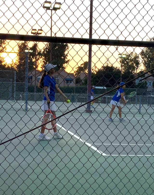 Pictured above are two Flashes girls tennis as they get ready to serve the ball to the Santa Clara players in their match last Tuesday, September 17th. Photos courtesy Coach Lolita Bowman.