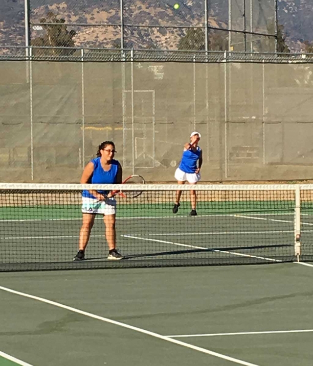 Lady Flashes Karime Renteria and Briana Lopez as they play in a doubles match against Villanova. Photo courtesy Coach
Bowman. 