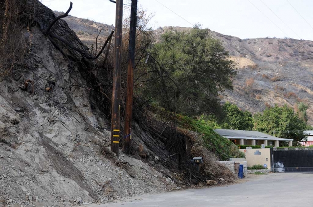 The Thomas Fire left behind destruction almost everywhere it went. Above is a photo taken on Grand Avenue after the fire, which left behind burned mountains, orchards and some structures. The fire threatened homes all along Grand Avenue, but no homes were lost.