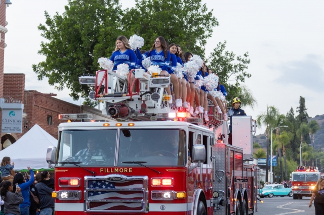 Pictured above is the Fillmore High School JV & Varsity Cheer Squads riding on Fillmore Fire Engine 91, ending the Homecoming parade last Thursday. Photo credit Crystal Gurrola.