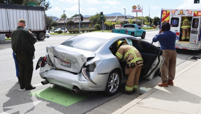 On Thursday, March 13th, at 2:36 p.m., Fillmore Police Department, Fillmore City Fire, and AMR Paramedics investigated a semi-truck vs vehicle near the intersection of Ventura Street and B Street. Two ambulance transports were made; condition of the patients is unknown. Cause of the crash is under investigation. Photo credit Angel Esquivel.