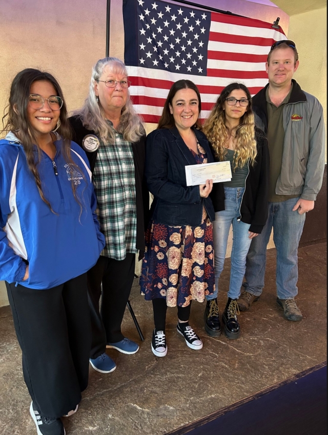 Pictured (l-r) are Kianna Toyoolea, Coach Cindy Blatt, teacher Hannah Faith and Bibiana Ortega attending the Fillmore Rotary Club. They were presented with a donation check for $500 for the Fillmore High School Swim Team. Presenting the check was Rotarian Andy Klittich. Photo credit Martha Richardson. 