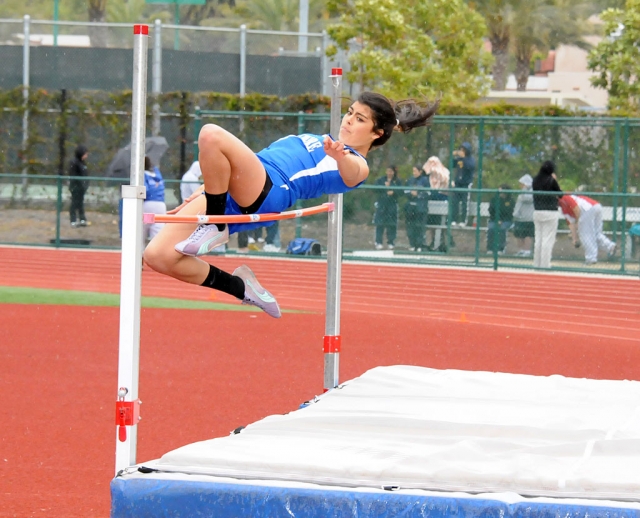 Ashley Coert attempts the high jump during last Thursday’s Track Meet.