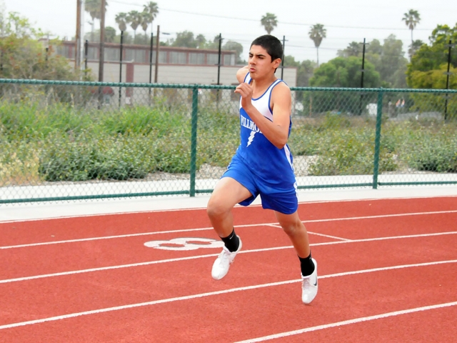 A Fillmore runner competes in the 4 by 1 last Thursday. Fillmore came in second.