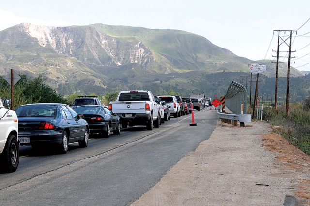 A paving project on Highway 23 at Bardsdale Bridge has begun, and continues south for four miles. Work will take place from 7 a.m. to 5 p.m. weekdays. The project is expected to take about 45 days to complete. Vehicles are allowed through the area, but there are long delays. A flagger controls the flow of traffic. Granite Construction of Ventura was awarded the $1.3 million contract for the work.
