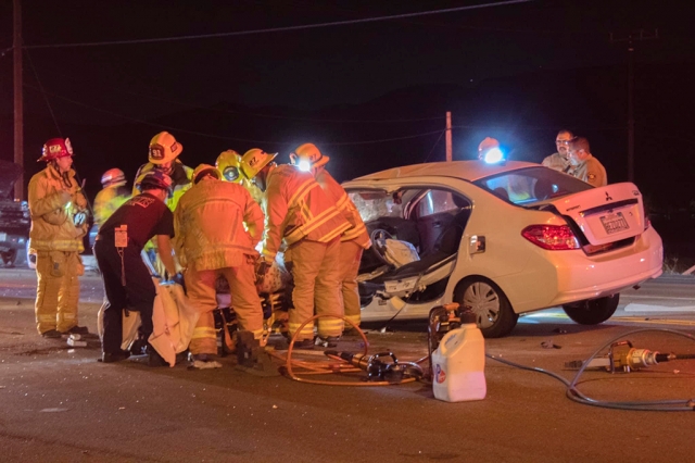 On Wednesday, July 6th, 2022, at 9:03pm, Fillmore Fire Department, Ventura County Fire, AMR Paramedics, and the Ventura County Sheriff ’s Department were dispatched to a reported traffic collision in the area of Ventura St/D St, Fillmore. Arriving fire crews reported two vehicles involved, one vehicle with moderate damage, and one person reported trapped inside their vehicle. Firefighters were in progress, rescuing the occupant inside the car. They were treated by AMR personnel and transported to a local hospital, condition unknown. Three total patients, two tagged green-minor, and one tagged yellowmoderate. Two ambulance transports were made—cause of the crash remains under investigation. Photo credit Angel Esquivel-AE News.