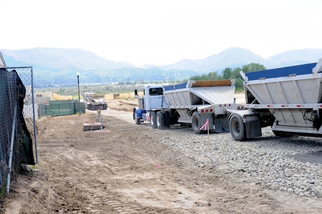 For the past few weeks, behind the Fillmore Vons Shopping Center on River Street, truckloads of construction material have been going in and out of the KB Homes Citrus Grove Development lot. The 3-story condos are expected to house 375 residents in 104 units.